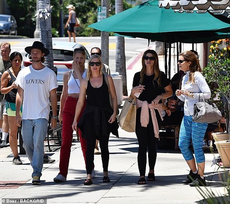 Katherine Schwarzenegger (second right) with her mother Maria Shriver (right), brother Patrick (left) and his girlfriend Abby Champion (second left)